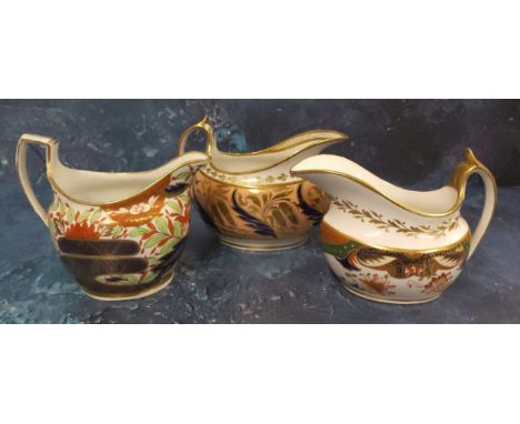 A Spode boat shaped jug, pattern 1645, in the Imari palette, 14cm wide, painted mark; a Barr Worcester jug, deep salmon band 