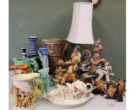 A Capo-di-Monte figural table lamp, modelled by Menegheth, of a boy, girl and hound, wooden base;&nbsp; others, various, Tram