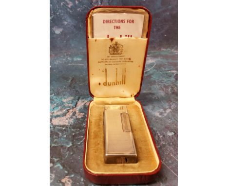 A mid 20th century Dunhill silver plated gas cigarette lighter,&nbsp; leather case 