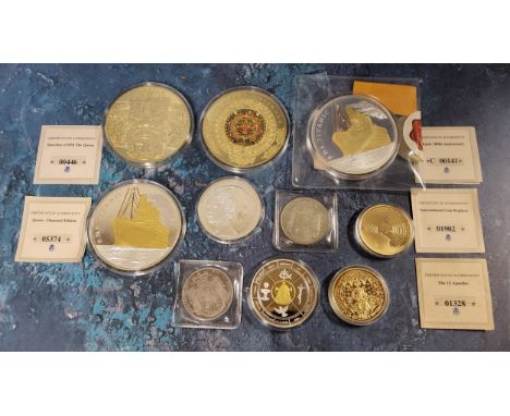 Numismatics - Proof Coins - two substantial gold plated Mayan calendar pictorial collectible coins; Two RMS titanic coins; Qu