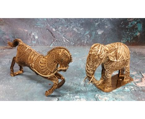 An Indian silver filigree elephant, standing, with trunk down, 7.5cm high;&nbsp; another, rearing horse (2) 