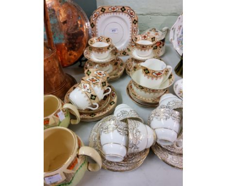A Gladstone China tea service;&nbsp; a Royal Staffordshire tea service;&nbsp; a pair of graduated ovoid jugs;&nbsp; etc 