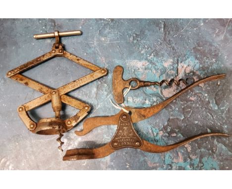 A Lund single lever corkscrew, marked 'LUND PATENTEE &amp; LONDON' to one side, the other '24 FLEET ST &amp; 57 CORNHILL LOND