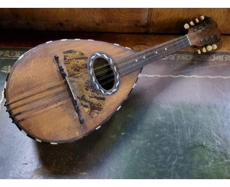 A Neopolitan Mandolin, Ferdinando Lapini, tortoise shell and mother of pearl inlay, bone tuners, c.1900 