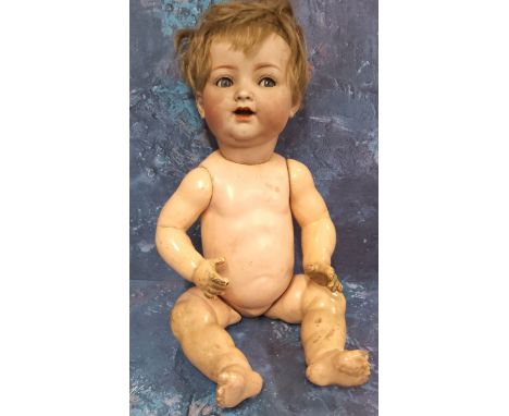 A Simon &amp; Halbig/K&amp;R 126 bisque head baby doll, German c.1920, with blue glass eyes, open mouth with two upper teeth,