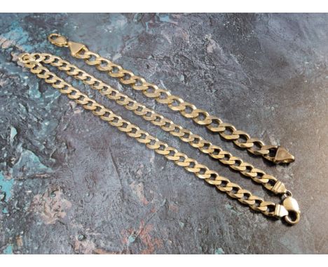 A silver curb necklace 46cms; a gents silver curb bracelet, 21cms 92.3g total 