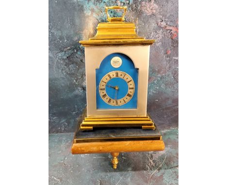 A Thwaites and Reed brass carriage clock, silvered chapter ring, Roman numerals, pierced brass hands, eight-day spring driven