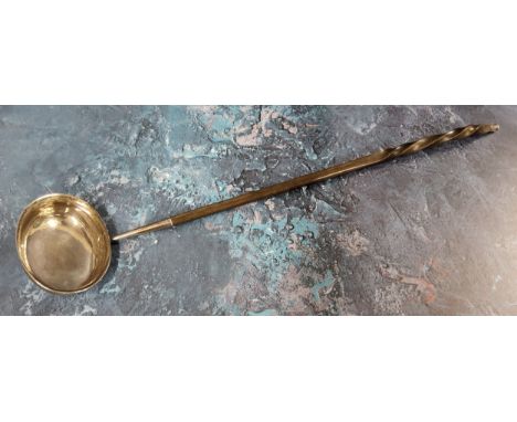 A George III silver toddy ladle, oval bowl engraved with monogram, wrythen whale bone handle, 41cm long, c.1760 