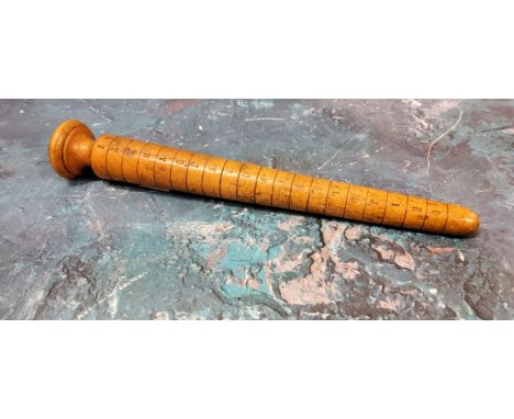 A 19th century boxwood ring sizer, 20cm long, c.1880 