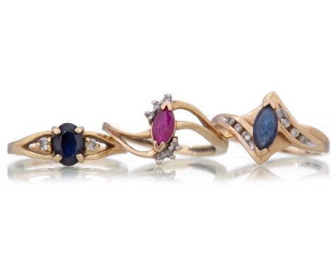 THREE GEM SET RINGS comprising two sapphire and one ruby example, the two sapphire examples flanked by diamonds, the ruby exa