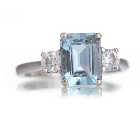 AQUAMARINE AND DIAMOND RING set with a step cut aquamarine of approximately 2.07 carats, flanked by round brilliant cut diamo