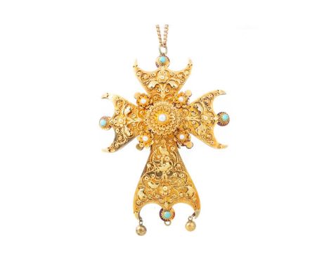 TURQUOISE AND PEARL CROSS PENDANT with ornate scrollwork decoration and tortoiseshell backing, brooch pin to the reverse, unm