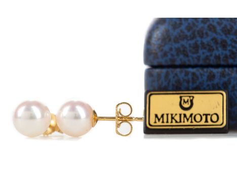 PAIR OF MIKIMOTO PEARL STUD EARRINGS with eighteen carat gold posts7.50mm diameterGenerally worn but in fair condition.Age un
