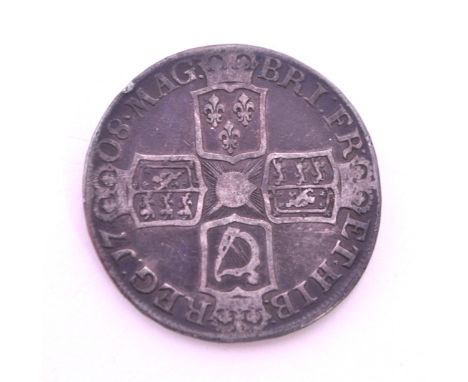 A 18th century 1708 Queen Anne post union silver crown coin. The coin having Queen Anne second bust (left) to obverse, with C