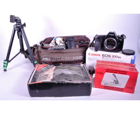Canon - A collection of vintage mid 20th century Canon 35mm cameras and accessories. The collection to include a Canon EOS 30