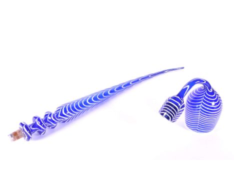 Late 19th century Nailsea blue and white glass pipe. Decorated with a combed texture. Measuring approx. 71cm long. Sold AF.