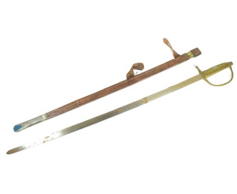 A mid-20th Century Nigerian West African Hausa people tribal sword I Tuareg. The metal handle and guard with long tapering bl