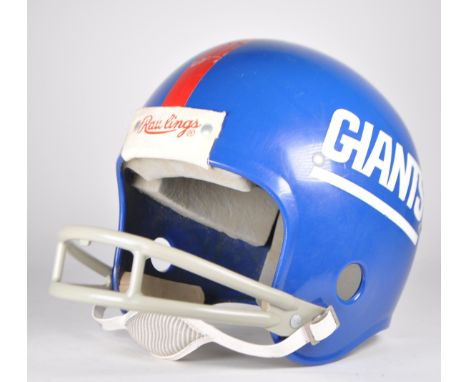 New York Giants - NFL - American Football - Late 20th century cica 1980s American football helmet. In a blue colourway with r