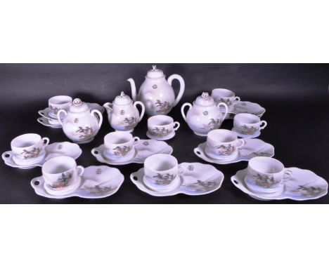 Early 20th century Japanese eggshell porcelain tea service, comprised of a teapot, tea cups, saucers, twin handled pots and m
