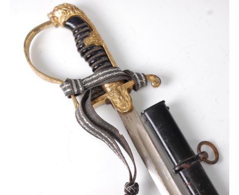 A German Third Reich Army Officer's sword, the 80cm curved fullered marked to the ricasso F.W. Holler Solingen having a gilt 