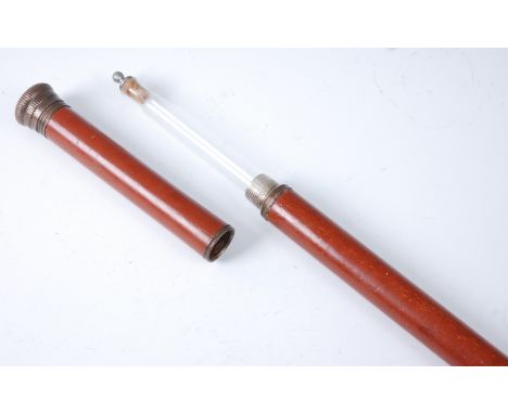 An early 20th century tippling stick, having a malacca shaft with copper cap housing a glass flask, 89cm.