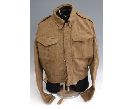 A WW II Battledress blouse, with Home Guard cloth shoulder titles, Cam 101 badges and Anti-Aircraft Command formation signs, 
