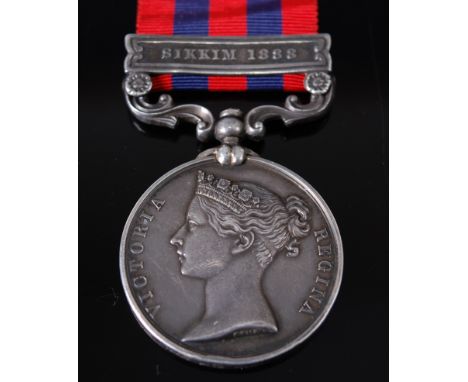 An India General Service medal (1854-95) with Sikkim 1888 clasp, naming in tight flowing script 662 Pte. W. Smith 2nd Bn Derb