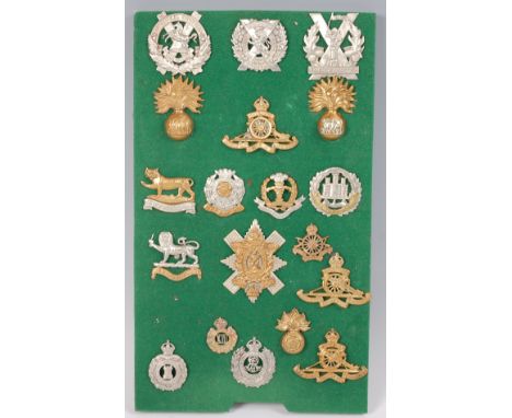 A collection of British Army cap badges and insignia, mainly Infantry to include The Black Watch (Royal Highland Regiment) gl
