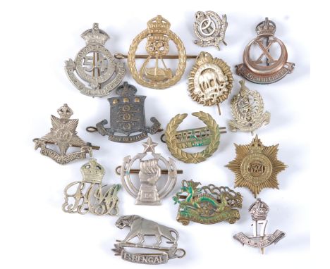 A collection of mainly Indian/Nepalease Regiment cap badges and insignia to include Baluch Regiment, 10th Gurkha Rifles Princ