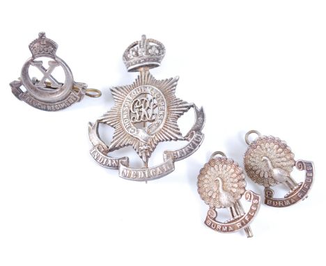 An Indian Medical Service white metal pagri badge, George V, together with a pair of George V silver Burma Rifles collar badg