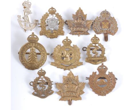 A collection of cap badges and insignia mainly Canadian Regiments to include Duke of York's Royal Canadian Hussars, Canadian 