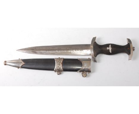 A German Third Reich Shutzstaffel SS dagger, the 22cm double edged blade etched "Meine Ehre heisst Treue" (My honour is loyal