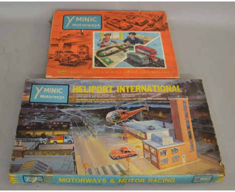 2 boxed vintage Tri-ang Minic Motorway slot car Sets including a hard to find M.1512 Public Transport Set which contains a tw