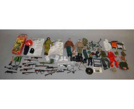 A mixed lot of vintage Action Man dolls and accessories including a boxed Palitoy example.