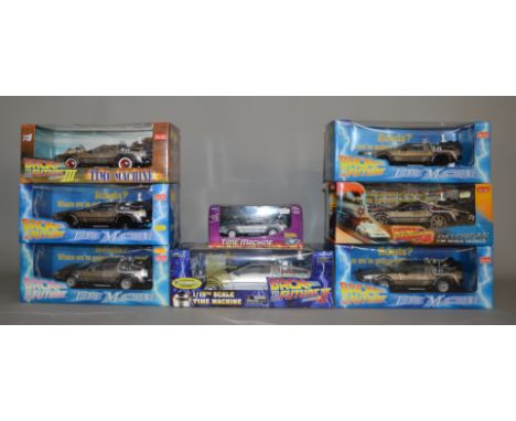 6x Sunstar Back To The Future 1:18 scale diecast models together with a Diamond exaple and a 1:24 model, all boxed. (8)