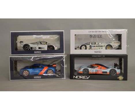 4x Norev 1:18 scale models including Limited Edition Porsche 962- 1000KM Nurburgring, Norev Collectors Sauber Mercedes C9, et