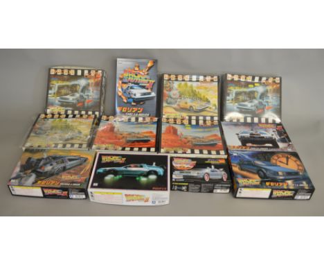 12x Back To The Future model kits including Japanese imports by Aoshima, some sealed.&nbsp;(Contents not checked for complete