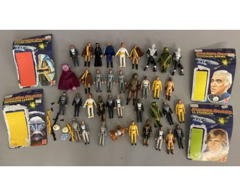 37 vintage assorted sci-fi action figures, mostly appear to be from the Mattel Battlestar Galactica range. With 4 backing car