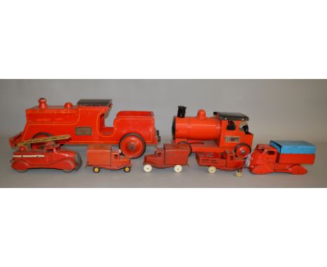 2 Unboxed Tri-ang floor trains, a wooden 62cm long locomotive and a Pressed Steel variant 33cm long, both generally G but bel