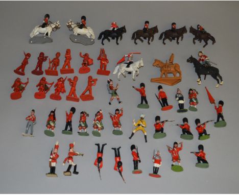 A quantity of vintage plastic British Army/ Band and similar toy figures, mostly timpo examples etc.