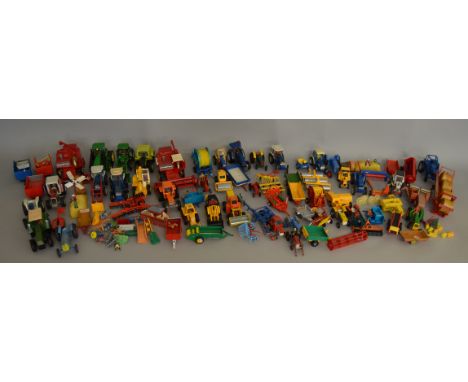 Approx 70 unboxed Tractor and agricultural diecast models and accessories, mostly Britains examples.