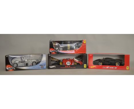 4x Hotwheels 1:18 scale models including a Hotwheels Elite 521S 1970 Daytona example, all boxed.