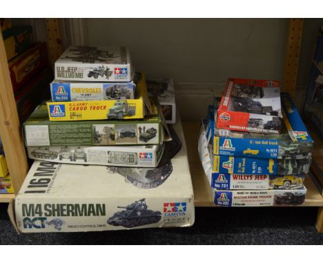 12x Assorted miliatry related model kits including Tamiya, Italieri and Airfix etc.&nbsp;(Contents not checked for completene