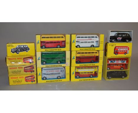 11 boxed vintage Budgie Toys diecast bus models, all different with some hard to find variations. Liveries include 'Esso Gold