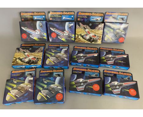 12 boxed Mattel Battlestar Galactica sets: 4x 2532 CYLON RAIDER, 4x 2531 COLONIAL VIPER, 4x 2534 COLONIAL SCARAB.