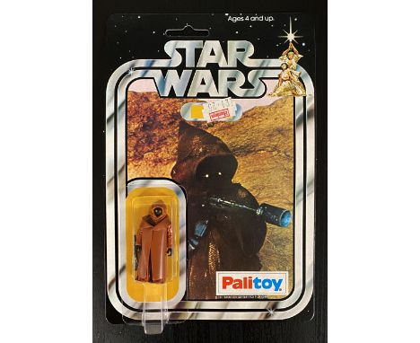 Palitoy Star Wars Jawa with rare Vinyl Cape on 12-back card. One of the rarest carded Star Wars figures in existence on this 