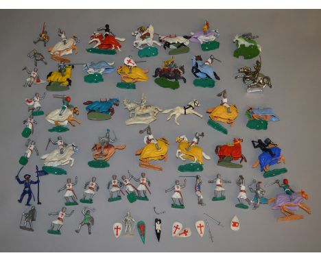 A quantity of vintage plastic Crusader toy figures, mostly Timpo examples.