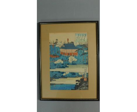 A 19th century Japanese coloured wood block print of a town square, signed, 35 x 23cm 