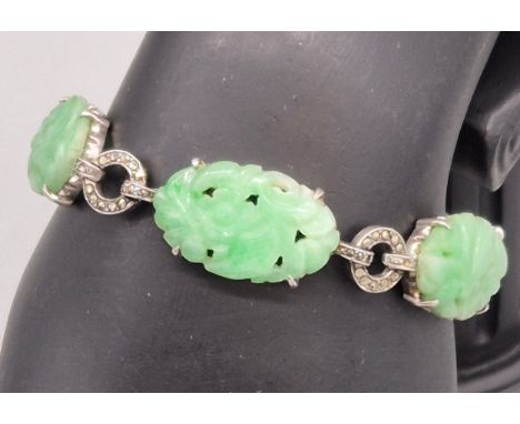 Chinese 1920's Sterling silver and hand carved jade bracelet. detailed with marcasite stones. 