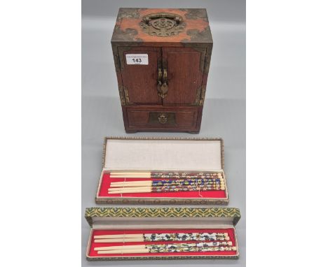 Chinese brass bound two door jewellery box together with two Boxed sets of Chinese ornamental cloisonne handle chop sticks 